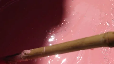 Pink paint liquid splash with bubbles. Video stock 161792127
