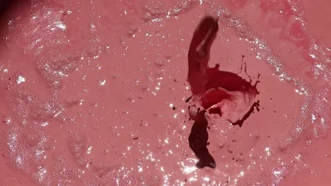 Pink paint liquid splash with bubbles. Stock Footage 161792247
