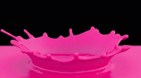 Pink paint or nail polish drop falling in slow motion and making crown splash Stock Footage 59462774