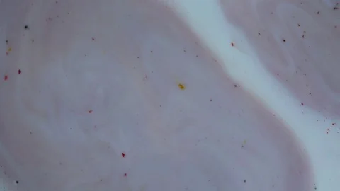 Pink pale paint stains on a white background. Ink is spreading. Video Stock Footage 123777915