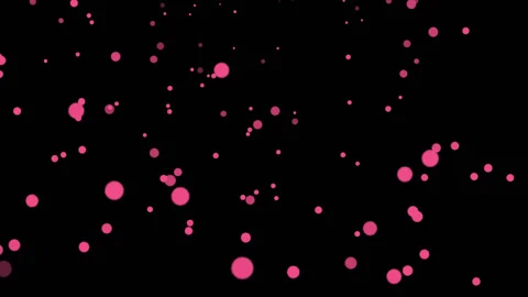 PINK particles glowing on the black background. Black background with light p Stock Footage 218575844