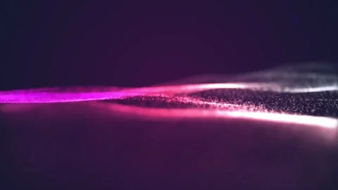 Pink particles on liquid waving Stock Footage 257087700