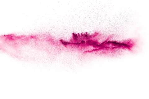 Pink particles splatter on white background. Pink powder exploding. Stock Photos