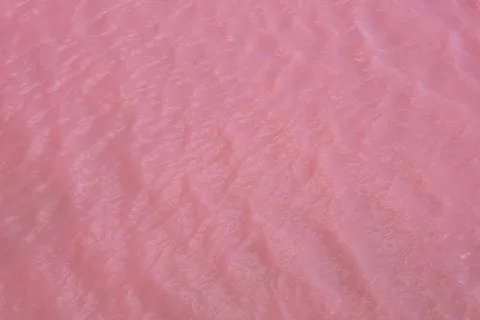 Pink pattern of water waves Stock Photos