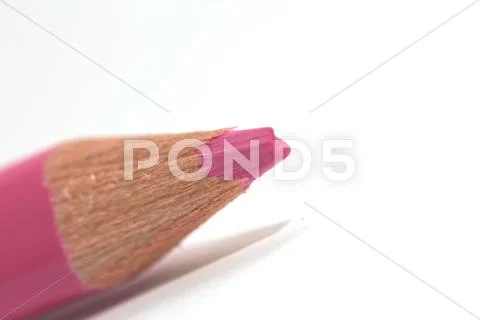Pink pencil on a white background. macro Stock Photos