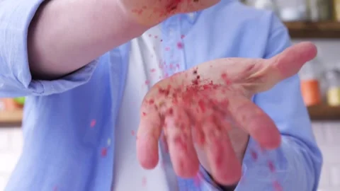 Pink pepper and hands. Stock Footage 133021534
