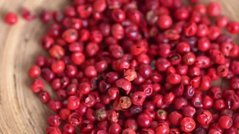 Pink pepper peas. Close up.The movement in a shot. Video stock 126596440
