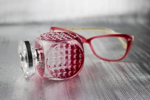 Pink perfume bottle Stock Photos