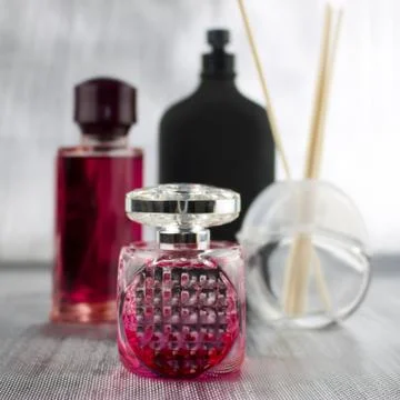 Pink perfumes composition Stock Photos