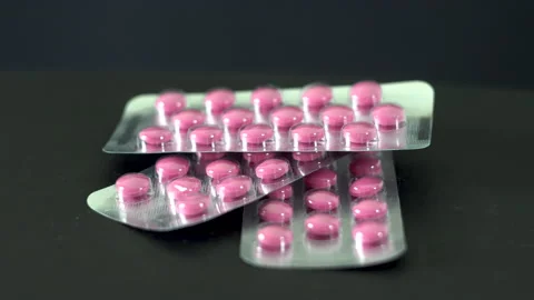 Pink pills 4K Video stock 156529635
