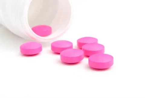Pink pills Stock Photos
