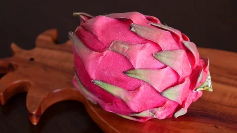 Pink Pitaya or Dragon Fruit On Wooden Table Stock Footage 71836824