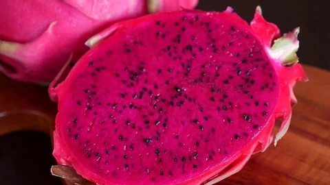 Pink Pitaya or Dragon Fruit On Wooden Table Stock Footage 71836857