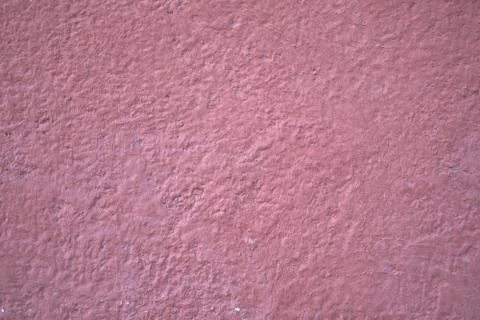 Pink plaster on a concrete wall Stock Photos