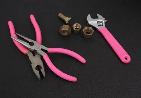 Pink plumber tools Stock Photos