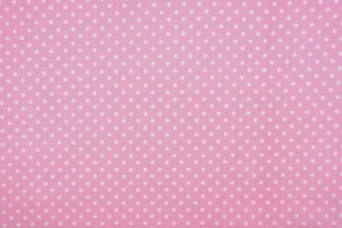 Pink polka dot background Stock Photos