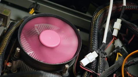 The Pink Processor Cooler On The Motherboard Is Spinning And Stop In Computer Ca Stock Footage 123077337