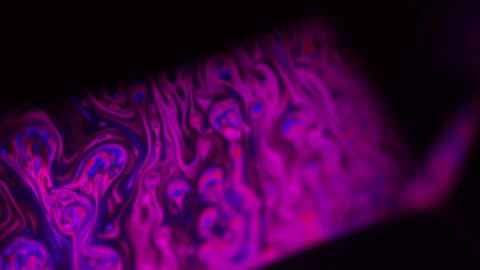 Pink Purple multi-colored liquid in macro, color change and reflection Stock Footage 279669856