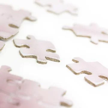 Pink puzzle Stock Photos