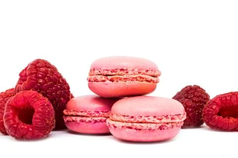 Pink raspberry macaroons, mint on white background Foto stock
