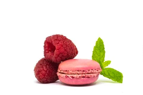 Pink raspberry macaroons, mint on white background Stock Photos