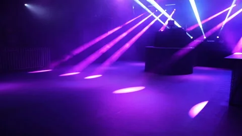 Pink rays of light in the night club empty dance floor static wide angle Stock Footage