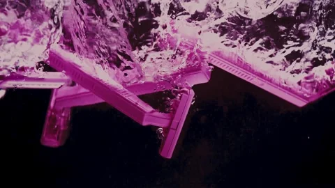 Pink Razers Drop and Splash in Water Stock Footage 300892432