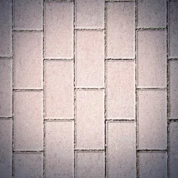 Pink rectangle pavement tiles. Texture background. Stock Photos