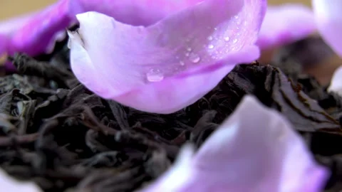 Pink Rose Petals with Dried Tea Leaves Rotating, Botanical Macro Vidéo 340524326