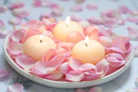 Pink roses and candles Stock Photos