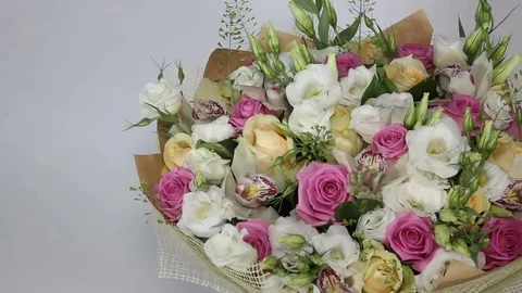 Pink roses and eustoma bouquet close up Stock Footage