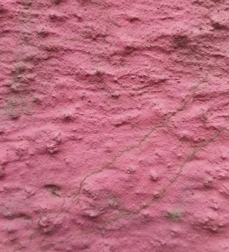 Pink Rough Stucco Plaster Wall Texture with Cracks Stock Photos