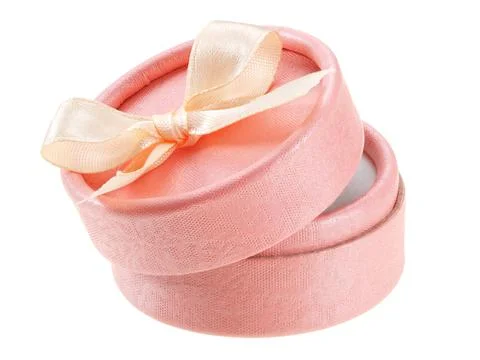 Pink round box for ring isolated on white background. Stock Photos