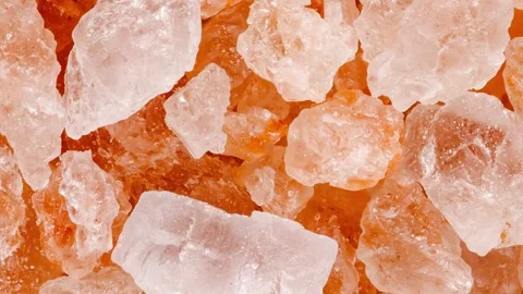 Pink salt, in bulk, crystals moving sideways Stock-Footage 255033601