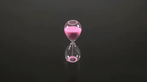 Pink sand clock on dark 60 Stock Footage 21224718