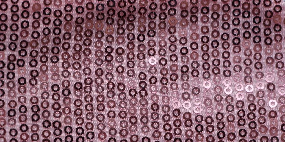 Pink sequins in sparkling backdrop pattern Stock Photos