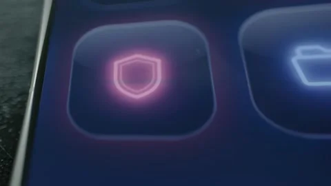 Pink shield icon glows beside a folder symbol Stock Footage 342487734