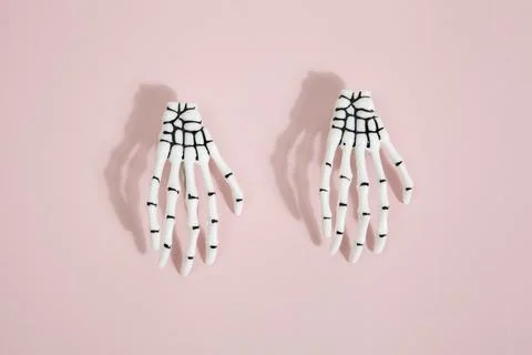 Pink skeleton hand Stock Photos