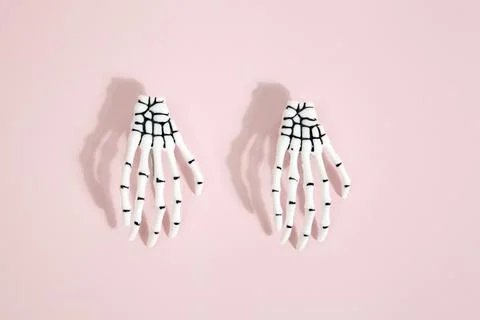Pink skeleton hand Stock Photos