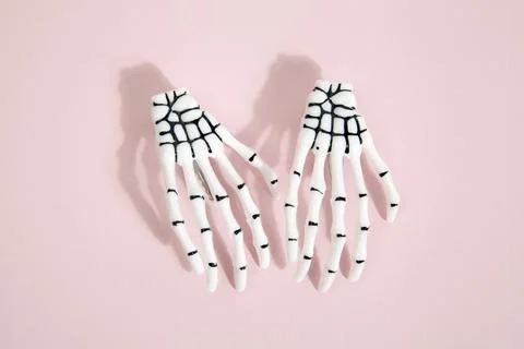 Pink skeleton hand Stock Photos