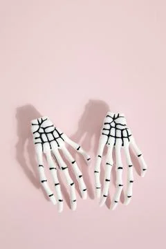 Pink skeleton hand Stock Photos