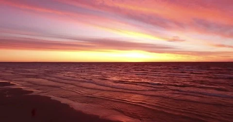 Pink sky and red storm waves. Beautiful  sunset over the  sea Stock Footage 71548035