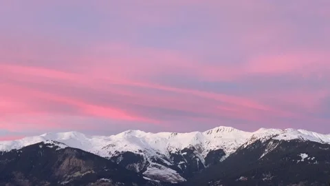 Pink sky over snowcapped mountain Stock Footage 334404009