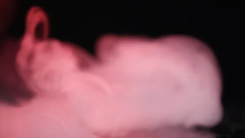 Pink smoke on black background Stock Footage 86441498