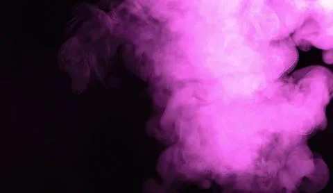Pink smoke cloud in dark background Stock Photos
