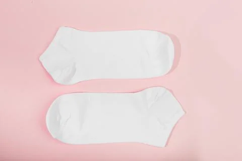 Pink socks background on pink Stock Photos