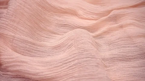 Pink soft fabric texture. The fabric moves slowly. Stock Footage 112626754