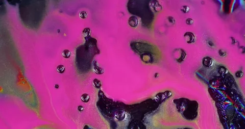 Pink spill bubbles art glowing chemical wet stream Video stock 320922031
