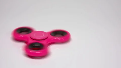 A pink spinner rotates on a white background. Stock Footage 77731543