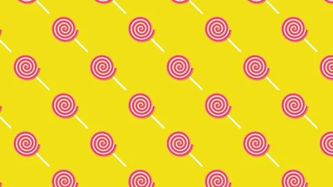 Pink spiral lollipop pattern on yellow background 動画素材 336488386